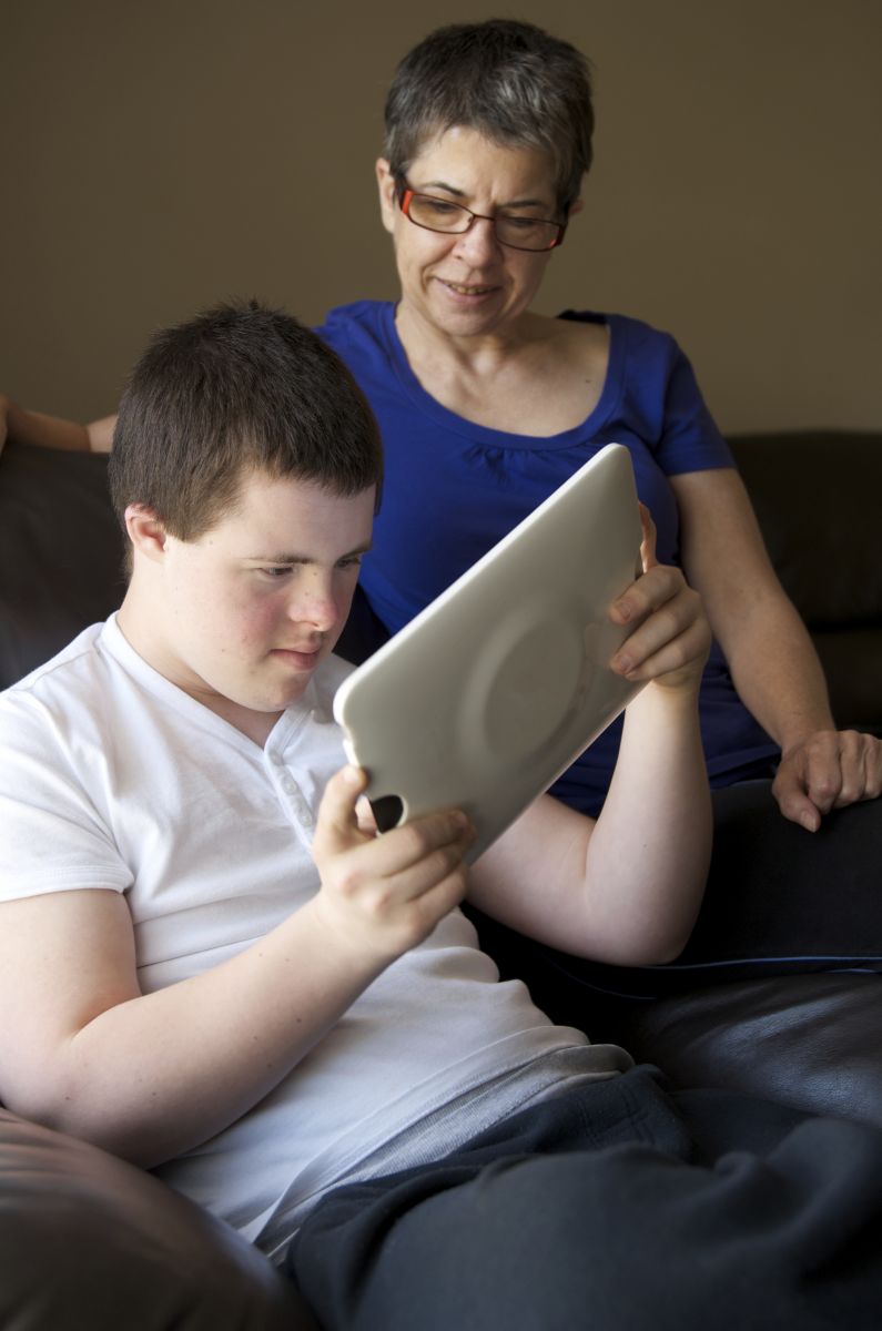 Boy using assistive technology